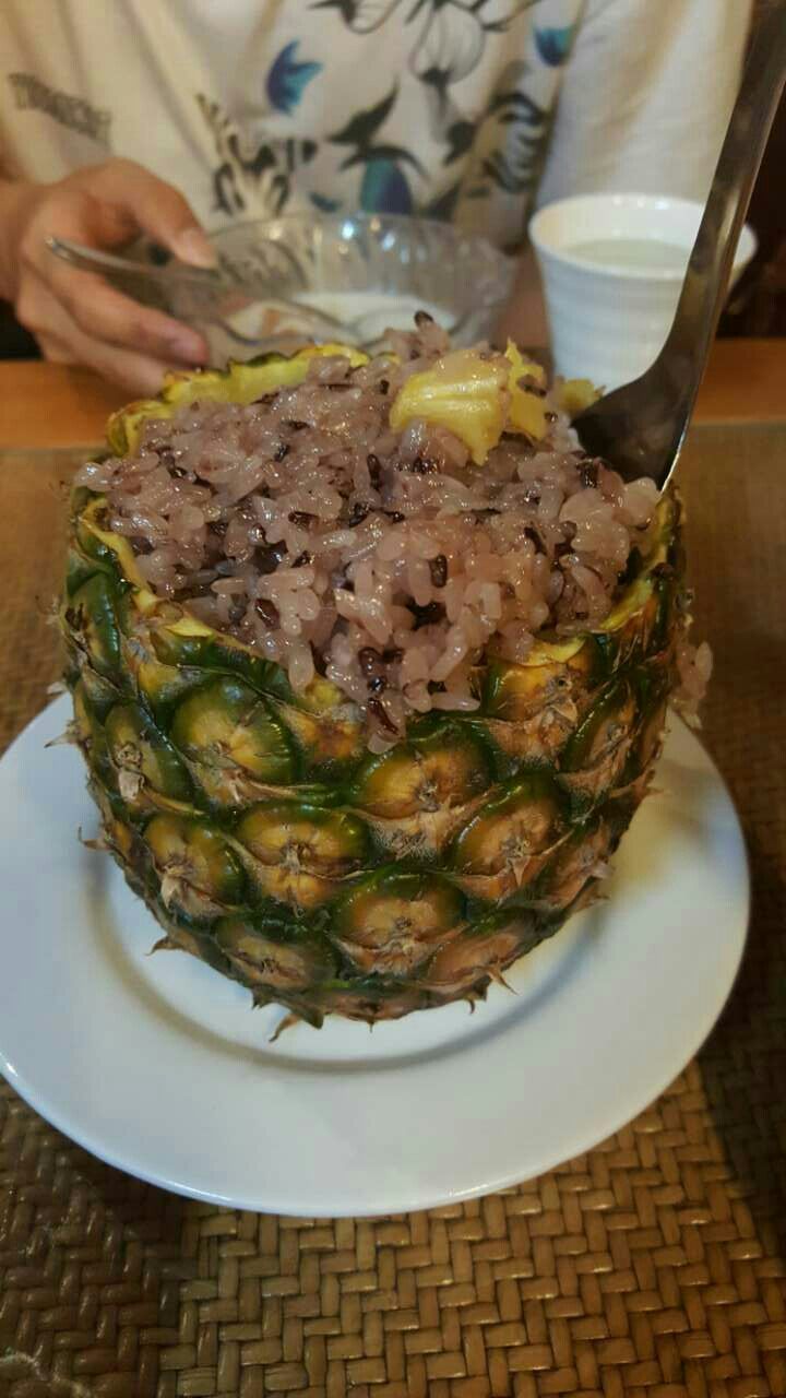 菠萝饭 (bō luó fàn), or simply “Pineapple Rice”
