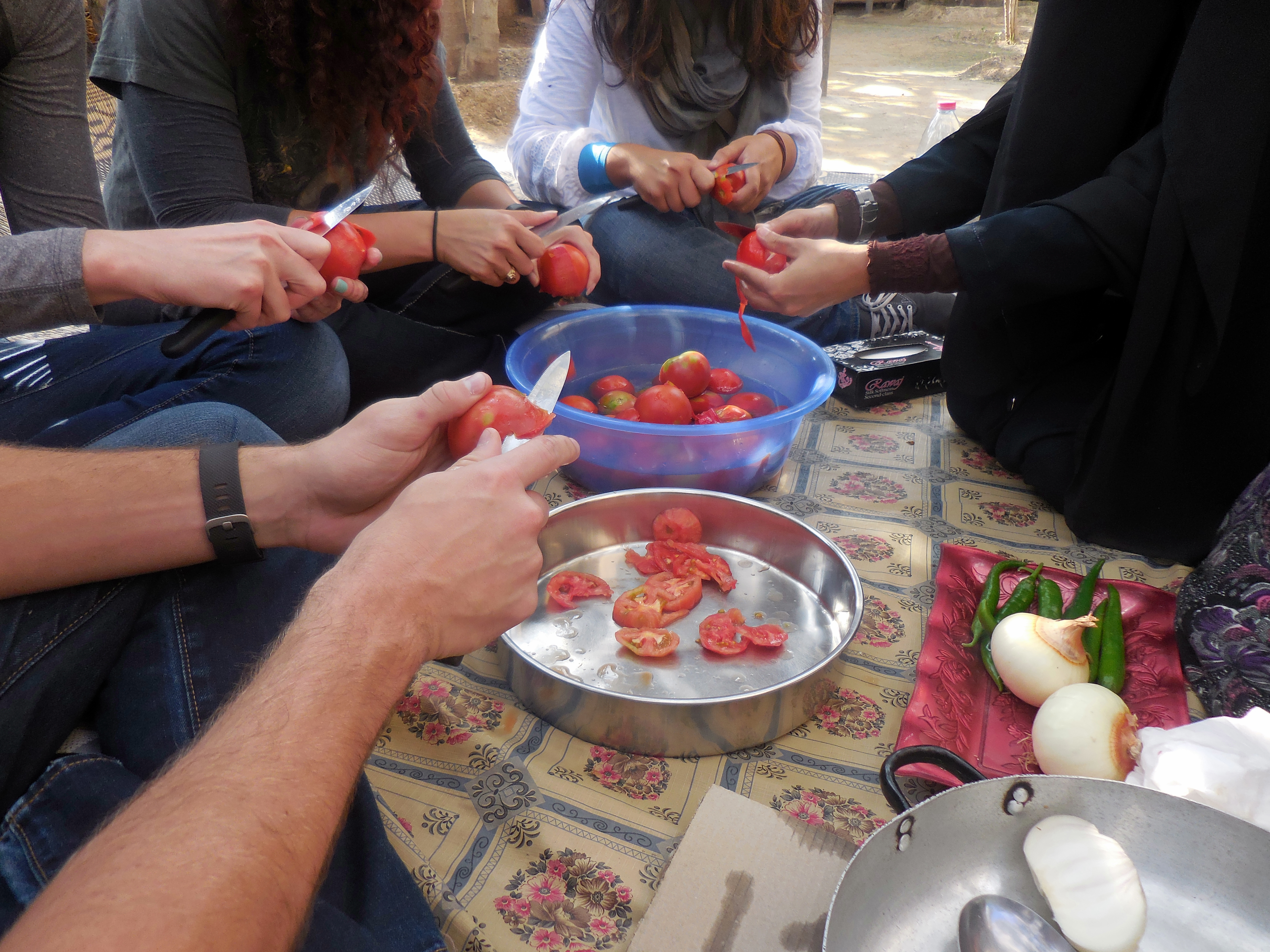 Peeling tomatoes. 