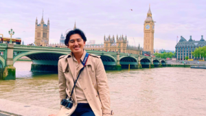 Ben Guo in front of Bridge and Big Ben in London